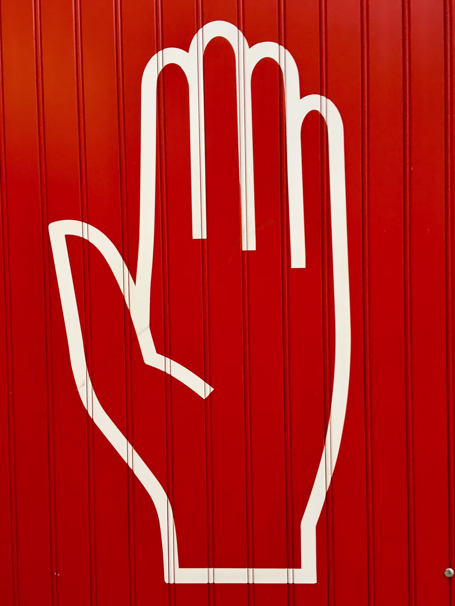 GrowthConsulting WhiteHandOnRedDoor